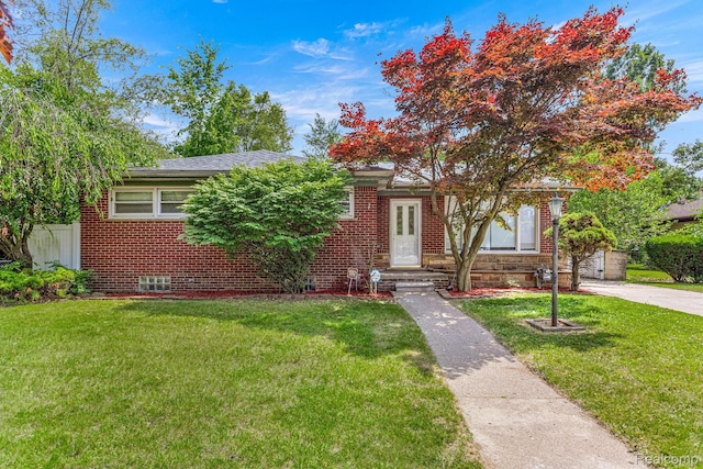 23621 Joy Rd, Redford, MI 48127 - view of front of home featuring a front lawn and brick siding