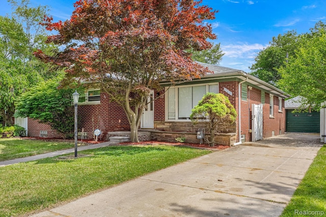 23621 Joy Rd, Redford, MI 48127 - view of front of house with brick siding and a front lawn