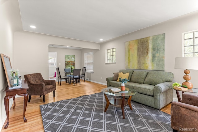 23621 Joy Rd, Redford, MI 48127 - living area with wood finished floors, healthy amount of natural light, and recessed lighting