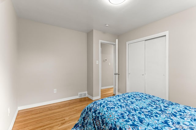 23621 Joy Rd, Redford, MI 48127 - bedroom with wood finished floors and a closet