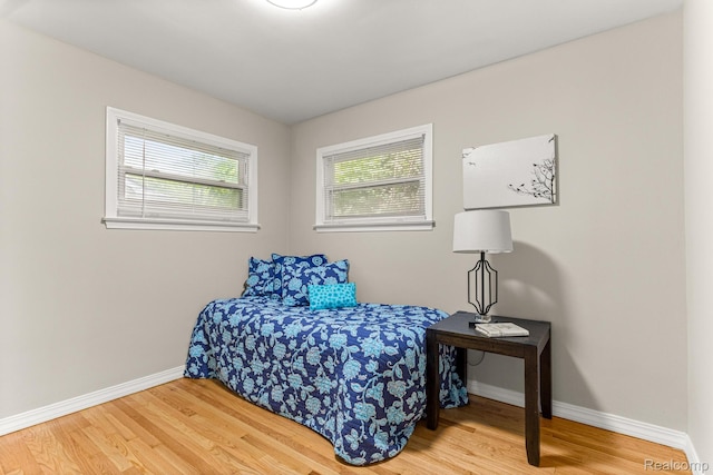 23621 Joy Rd, Redford, MI 48127 - bedroom featuring wood finished floors and baseboards