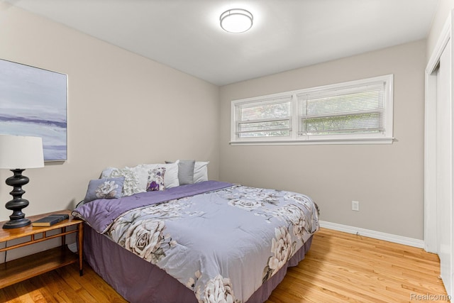 23621 Joy Rd, Redford, MI 48127 - bedroom featuring wood finished floors and baseboards