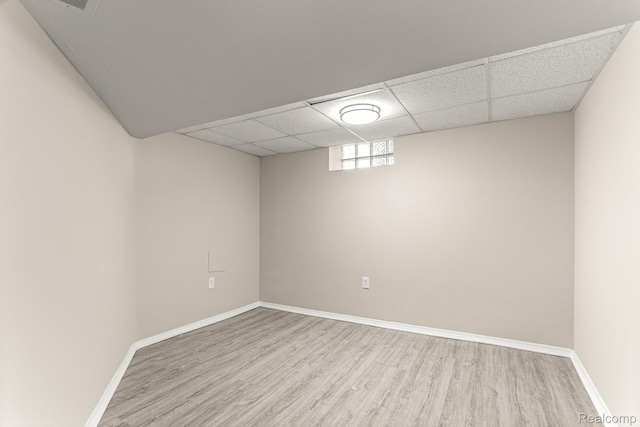 23621 Joy Rd, Redford, MI 48127 - below grade area with wood finished floors and a drop ceiling