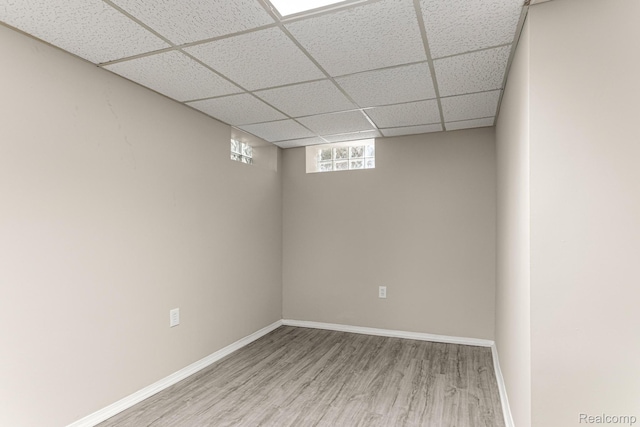 23621 Joy Rd, Redford, MI 48127 - unfurnished room featuring wood finished floors and a drop ceiling