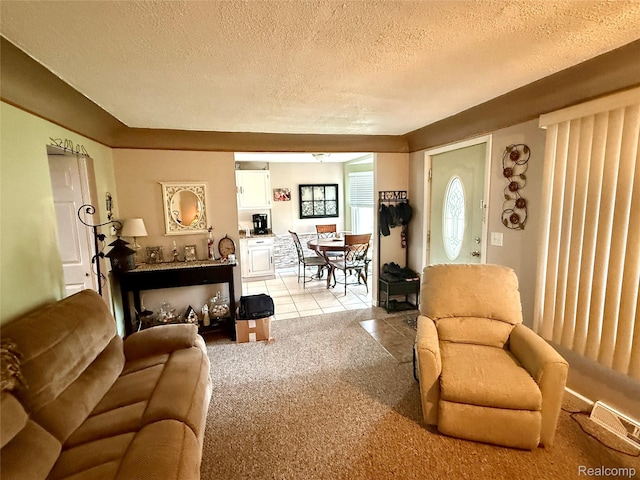 35717 Columbia Ave, Westland, MI 48186 - living room featuring a textured ceiling, light carpet, and light tile patterned floors
