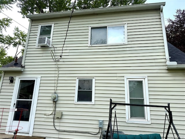 35717 Columbia Ave, Westland, MI 48186 - view of side of home with cooling unit and a shingled roof