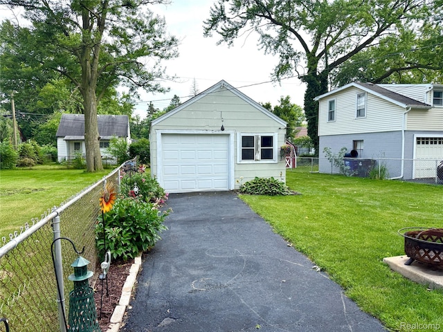 35717 Columbia Ave, Westland, MI 48186 - detached garage featuring asphalt driveway
