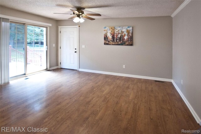 5280 Weston Ct, Commerce Twp, MI 48382 - unfurnished room with a ceiling fan, dark wood finished floors, and a textured ceiling