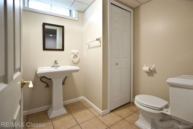 5280 Weston Ct, Commerce Twp, MI 48382 - bathroom with toilet and tile patterned floors