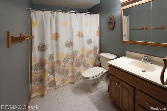 5280 Weston Ct, Commerce Twp, MI 48382 - bathroom featuring vanity, tile patterned floors, and a shower with shower curtain