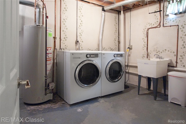 5280 Weston Ct, Commerce Twp, MI 48382 - laundry area featuring water heater and washing machine and clothes dryer