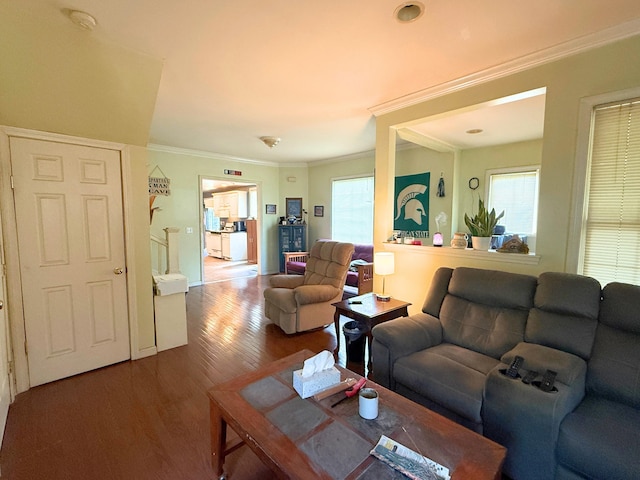 512 E Main St, Owosso, MI 48867 - living area featuring wood finished floors and ornamental molding