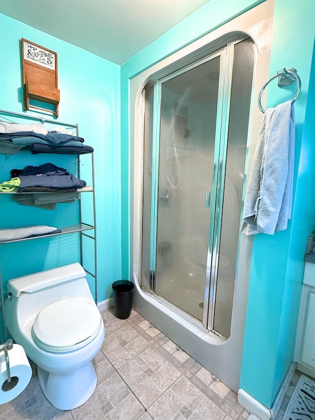 512 E Main St, Owosso, MI 48867 - full bathroom with a shower stall and toilet