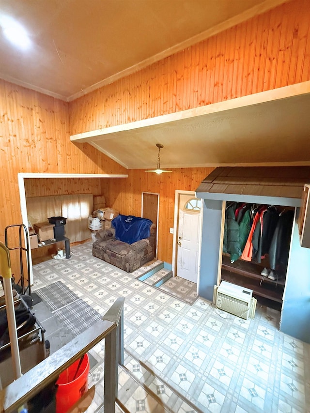 512 E Main St, Owosso, MI 48867 - bedroom with wood walls and tile patterned floors