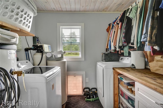 1191 W Frenchline Rd, Sandusky, MI 48471 - laundry room featuring washer and dryer, brick patterned flooring, wooden ceiling, and crown molding
