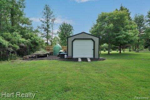 1191 W Frenchline Rd, Sandusky, MI 48471 - view of grassy yard featuring an outdoor structure