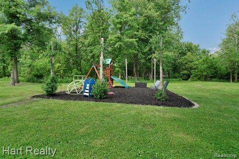 1191 W Frenchline Rd, Sandusky, MI 48471 - view of playground with a yard