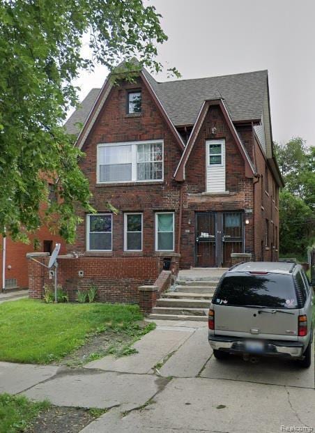 3336 Tyler St, Detroit, MI 48238 - tudor home with brick siding and a shingled roof