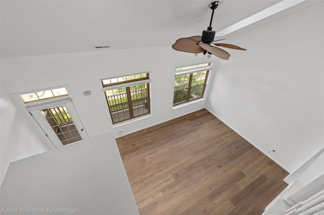 438 Old Pine Way, Walled Lake, MI 48390 - unfurnished living room with a ceiling fan and wood finished floors