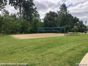 438 Old Pine Way, Walled Lake, MI 48390 - view of community featuring volleyball court and a yard