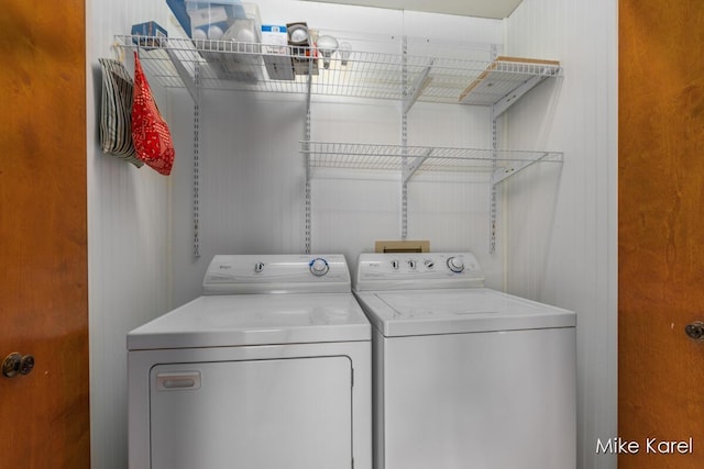 666 Waterview Ct SW, Grandville, MI 49418 - laundry area featuring washing machine and clothes dryer