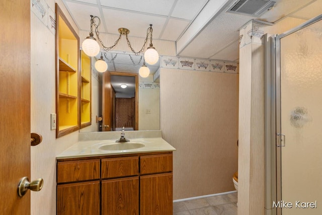 666 Waterview Ct SW, Grandville, MI 49418 - full bath featuring a stall shower, vanity, and wallpapered walls