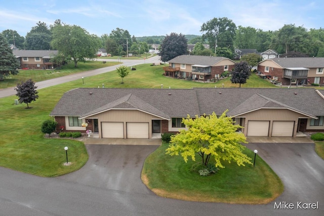 666 Waterview Ct SW, Grandville, MI 49418 - single story home with a garage, driveway, and a front yard