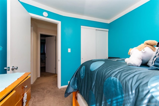24645 Greenbrier Ave, Eastpointe, MI 48021 - bedroom featuring light colored carpet and a closet