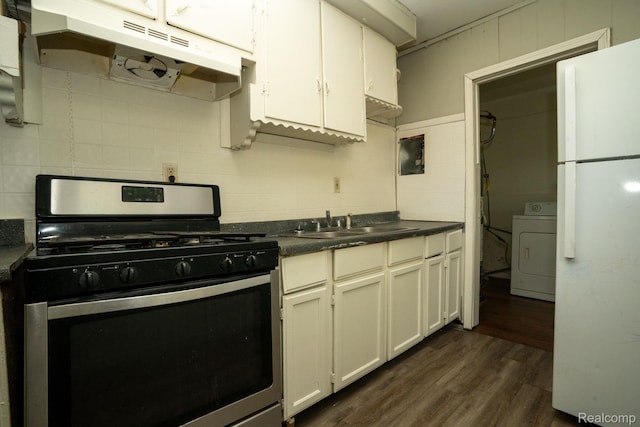 21890 Sharkey St, Clinton Township, MI 48035 - kitchen with gas stove, washer / clothes dryer, freestanding refrigerator, under cabinet range hood, and dark wood finished floors