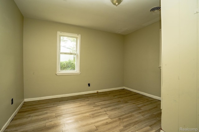 21890 Sharkey St, Clinton Township, MI 48035 - empty room featuring wood finished floors and baseboards