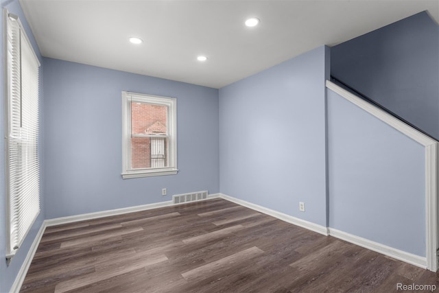 16629 Hubbell St, Garden City, MI 48235 - empty room with dark wood finished floors and recessed lighting