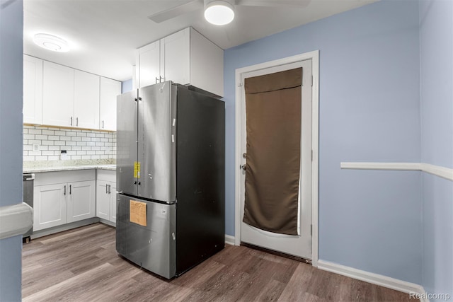 16629 Hubbell St, Garden City, MI 48235 - kitchen with freestanding refrigerator, ceiling fan, and white cabinets