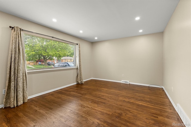 7420 Colonial St, Dearborn Heights, MI 48127 - empty room featuring wood finished floors and recessed lighting