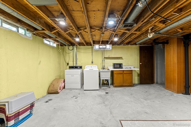 7420 Colonial St, Dearborn Heights, MI 48127 - basement with washer and clothes dryer and a sink