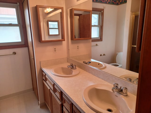 46817 Barbara Dr, Macomb, MI 48044 - full bathroom featuring plenty of natural light and double vanity
