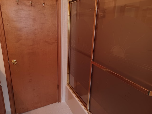 46817 Barbara Dr, Macomb, MI 48044 - full bath with combined bath / shower with glass door and tile patterned flooring