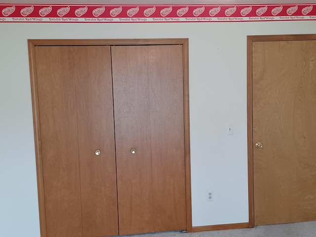 46817 Barbara Dr, Macomb, MI 48044 - unfurnished bedroom featuring a closet and carpet