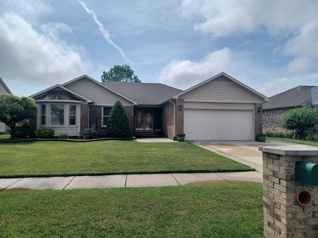 46817 Barbara Dr, Macomb, MI 48044 - single story home with an attached garage, driveway, brick siding, and a front lawn