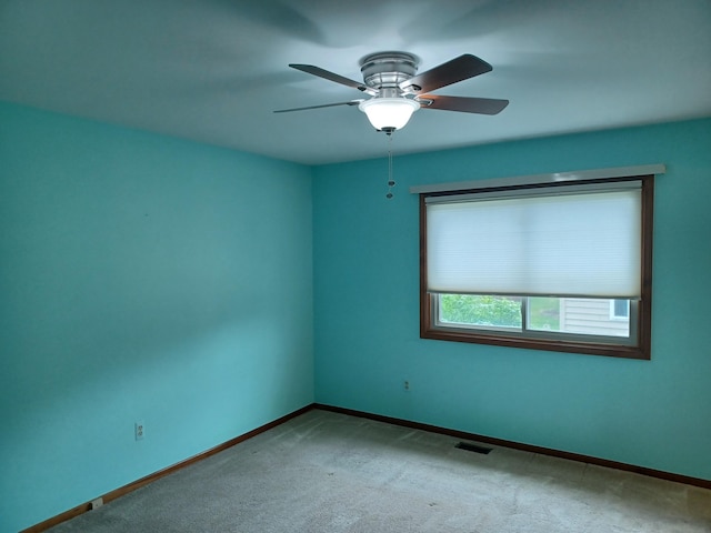 46817 Barbara Dr, Macomb, MI 48044 - carpeted spare room with baseboards and ceiling fan
