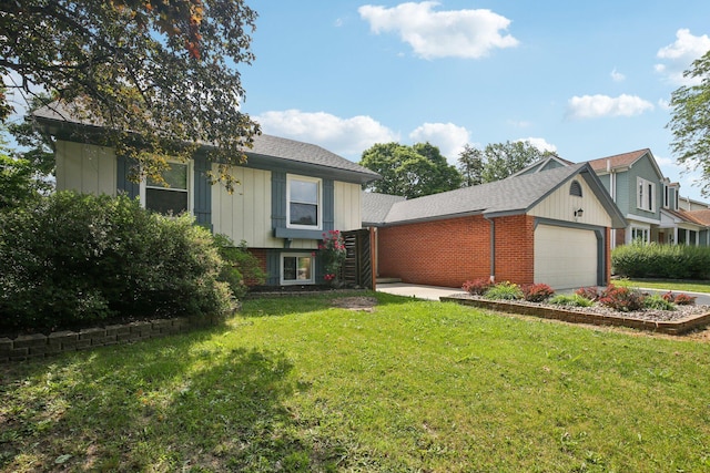 3320 Bluett Dr, Ann Arbor, MI 48105 - view of front of home with brick siding, a front lawn, a garage, and board and batten siding