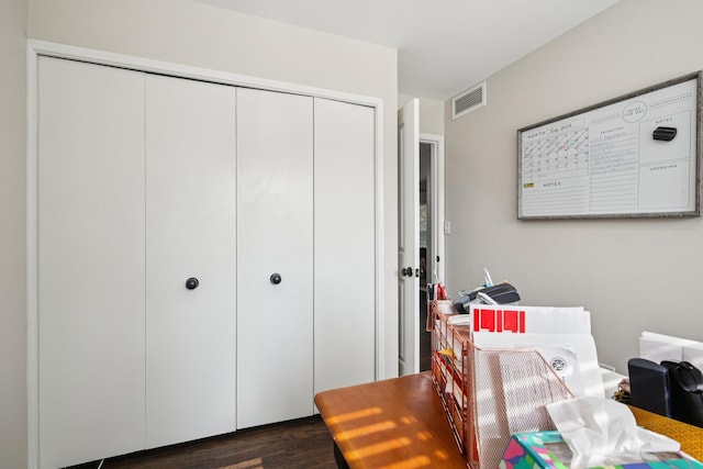 3320 Bluett Dr, Ann Arbor, MI 48105 - bedroom featuring a closet and dark wood-style floors