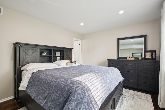 3320 Bluett Dr, Ann Arbor, MI 48105 - bedroom with dark wood-style flooring and recessed lighting