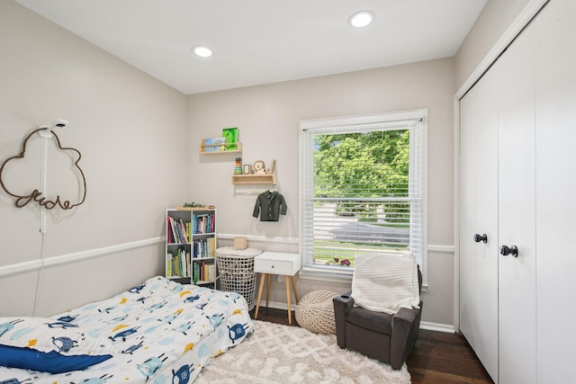 3320 Bluett Dr, Ann Arbor, MI 48105 - bedroom featuring a closet, wood finished floors, and recessed lighting