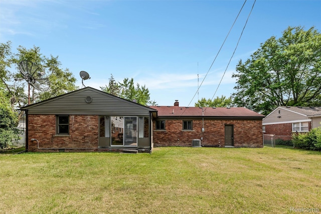16952 Mount Vernon St, Wixom, MI 48075 - back of house with brick siding and a chimney