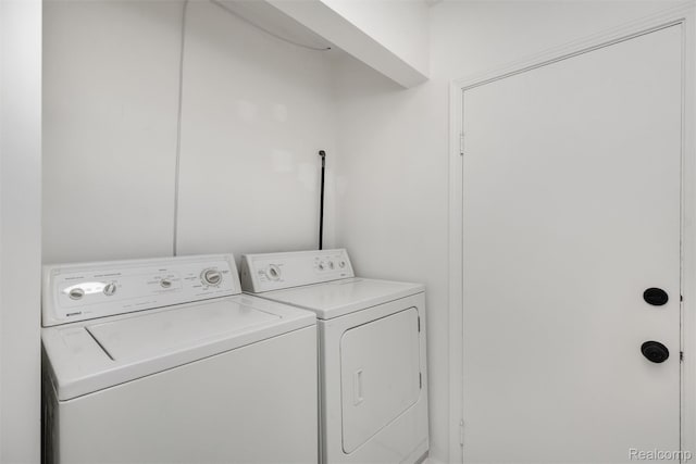 16952 Mount Vernon St, Wixom, MI 48075 - laundry room featuring washer and dryer