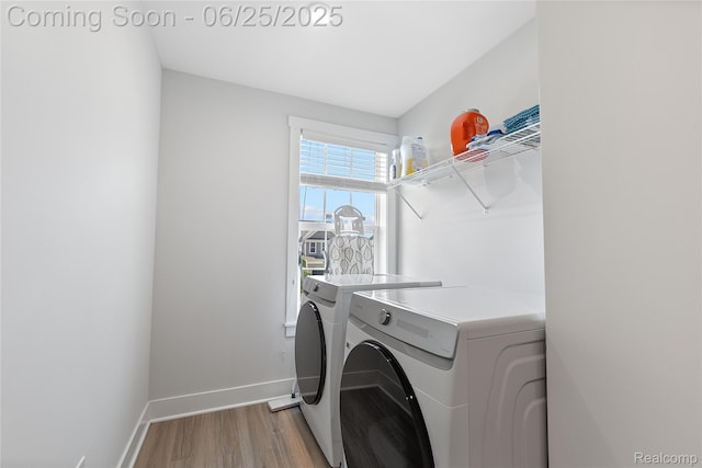 51008 Woodford Dr, Canton, MI 48188 - laundry area with independent washer and dryer and light wood finished floors