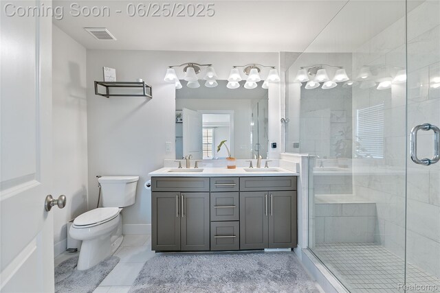 51008 Woodford Dr, Canton, MI 48188 - bathroom featuring double vanity, a shower stall, and tile patterned floors