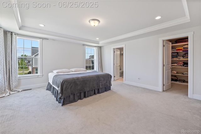 51008 Woodford Dr, Canton, MI 48188 - carpeted bedroom featuring a tray ceiling, a spacious closet, recessed lighting, ensuite bathroom, and a closet
