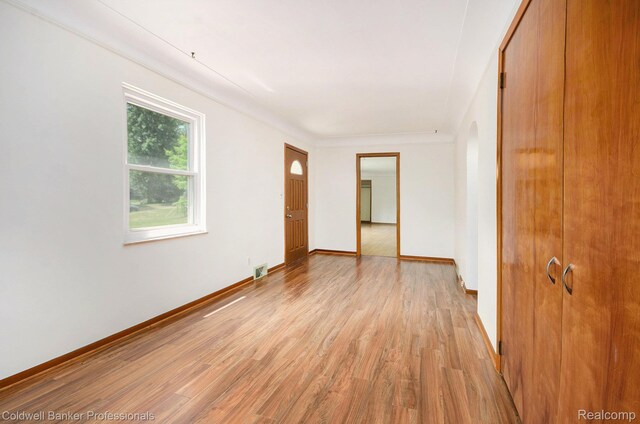2740 Judah Rd, Lake Orion, MI 48359 - unfurnished room with light wood-style flooring and baseboards