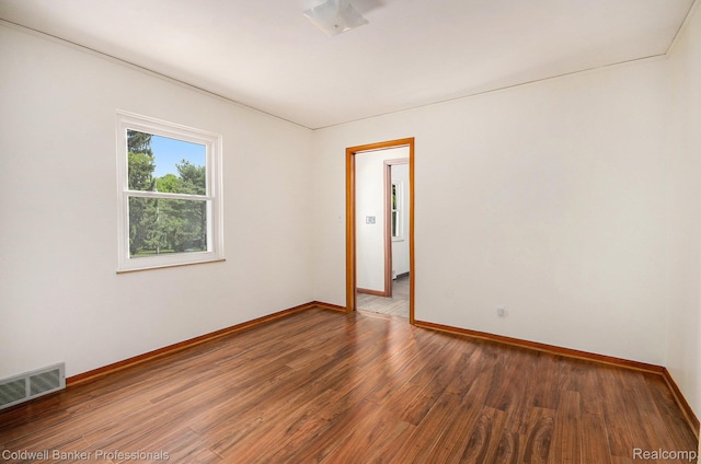 2740 Judah Rd, Lake Orion, MI 48359 - spare room featuring wood finished floors and baseboards